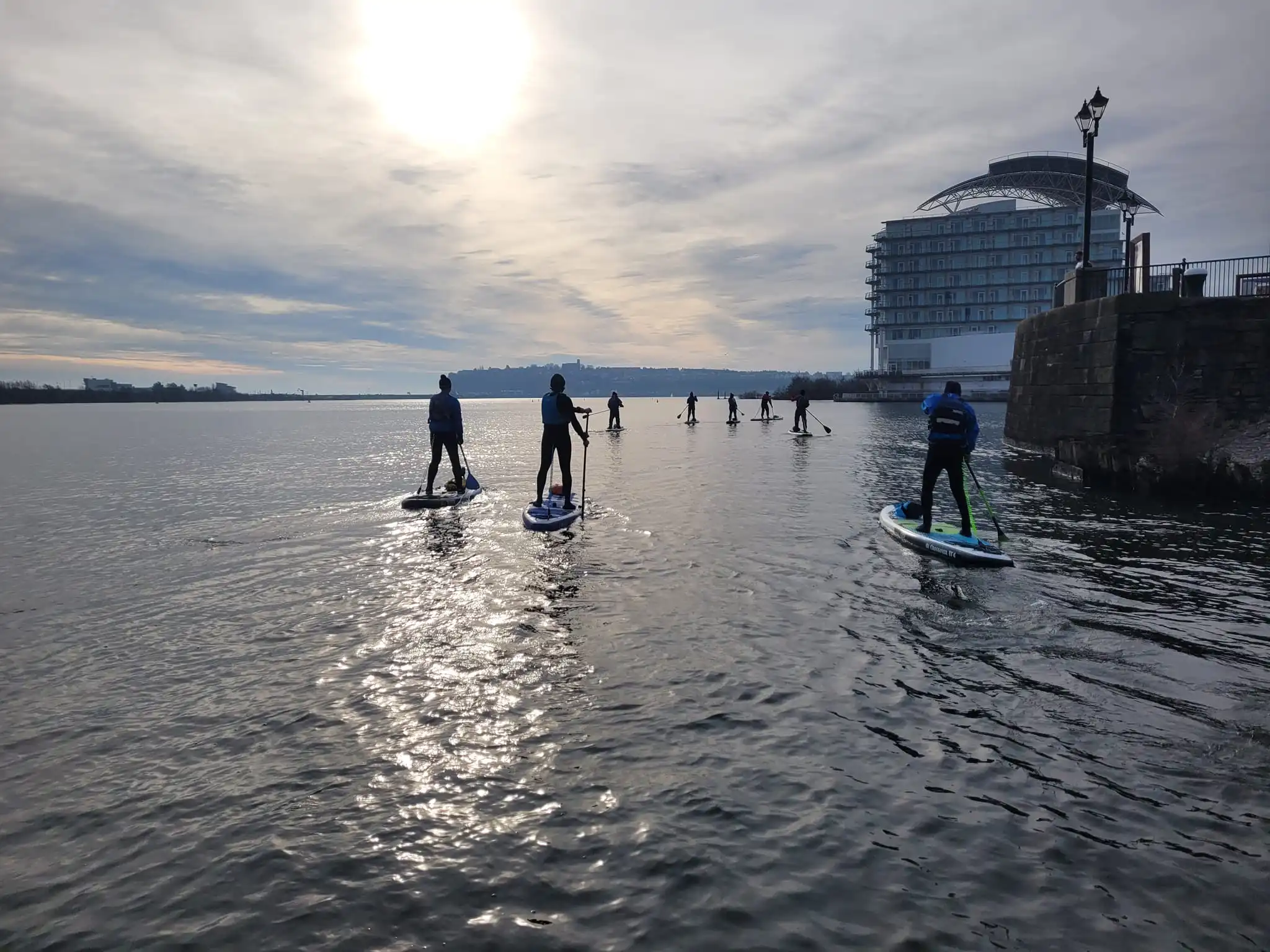 Group of paddleboarders in cardiff bay