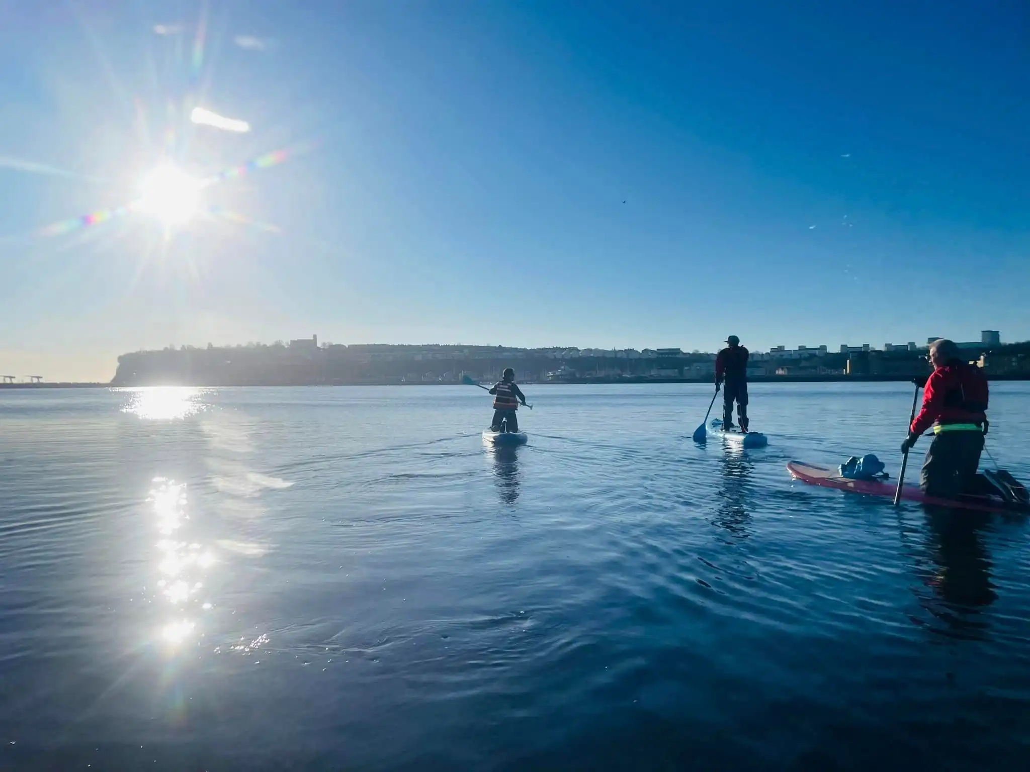 Group of paddleboarders in cardiff bay