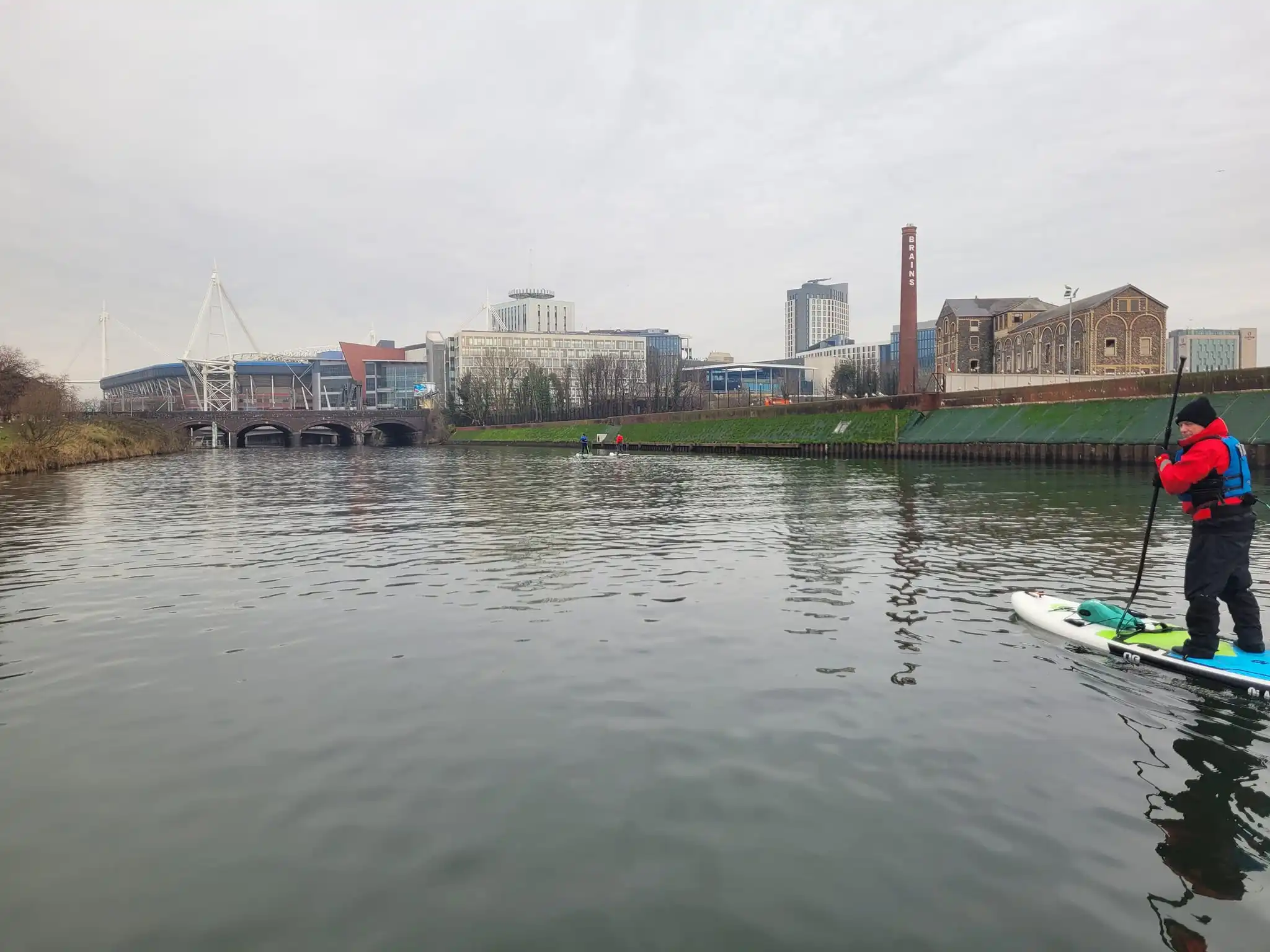 Paddleboarder on river taff