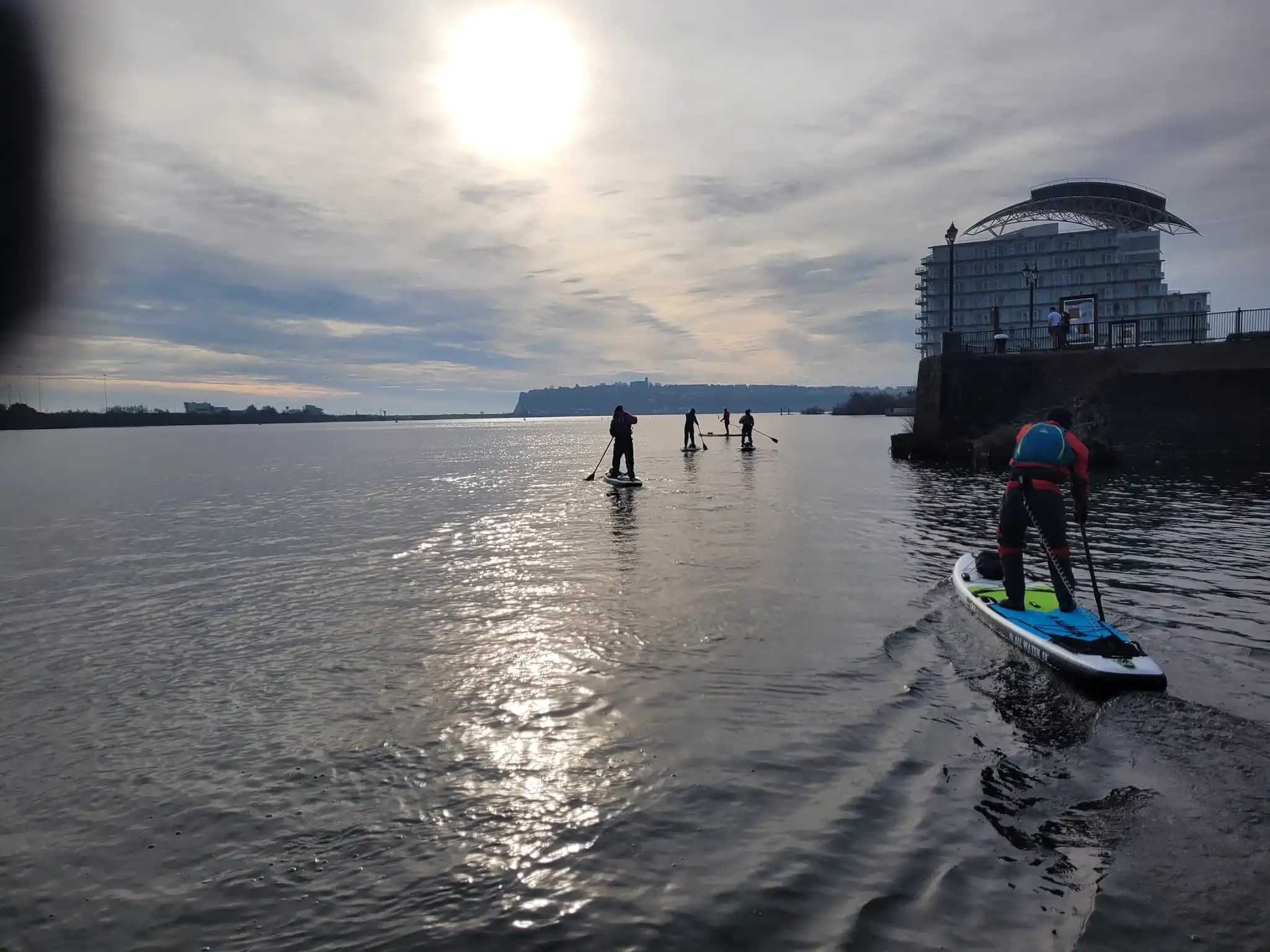 Group of paddleboarders in cardiff bay