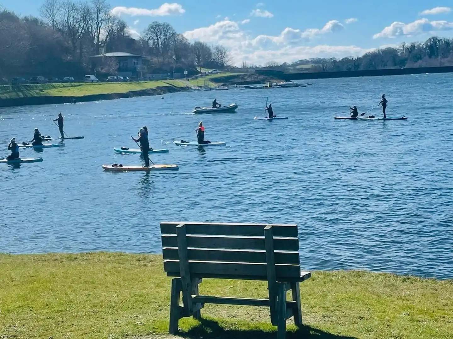 Group of paddleboarders on llandegfedd lake