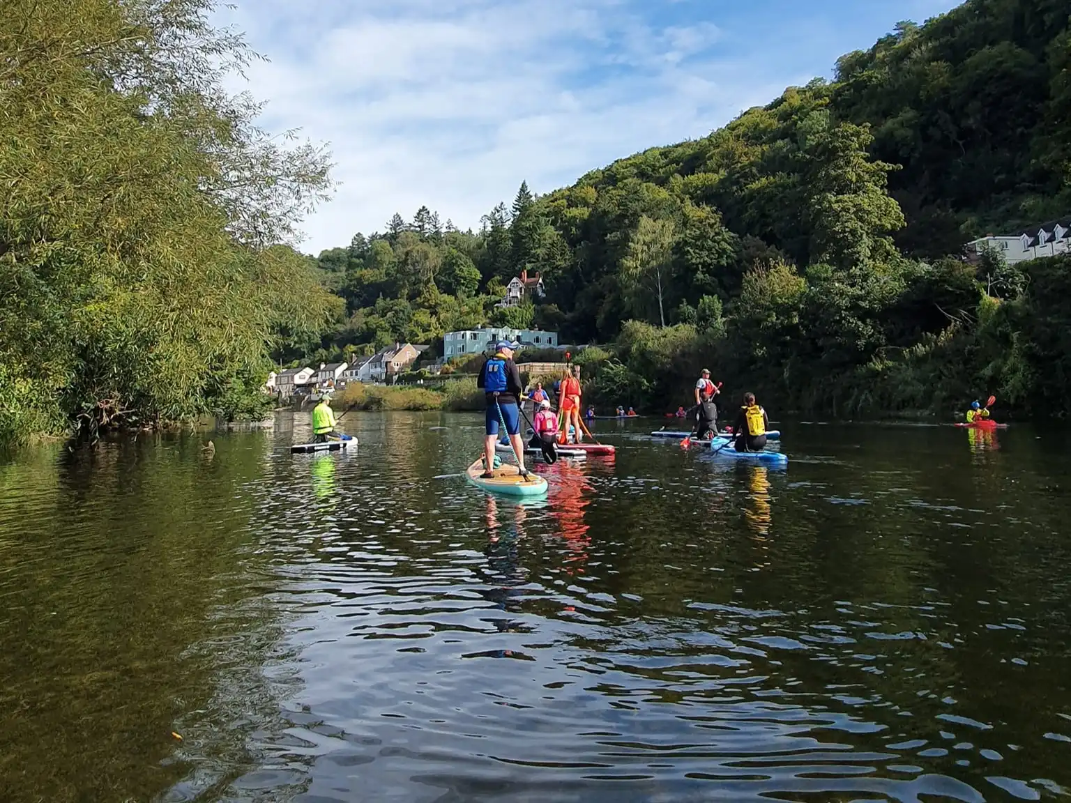 Group of paddleboarders on the river wye