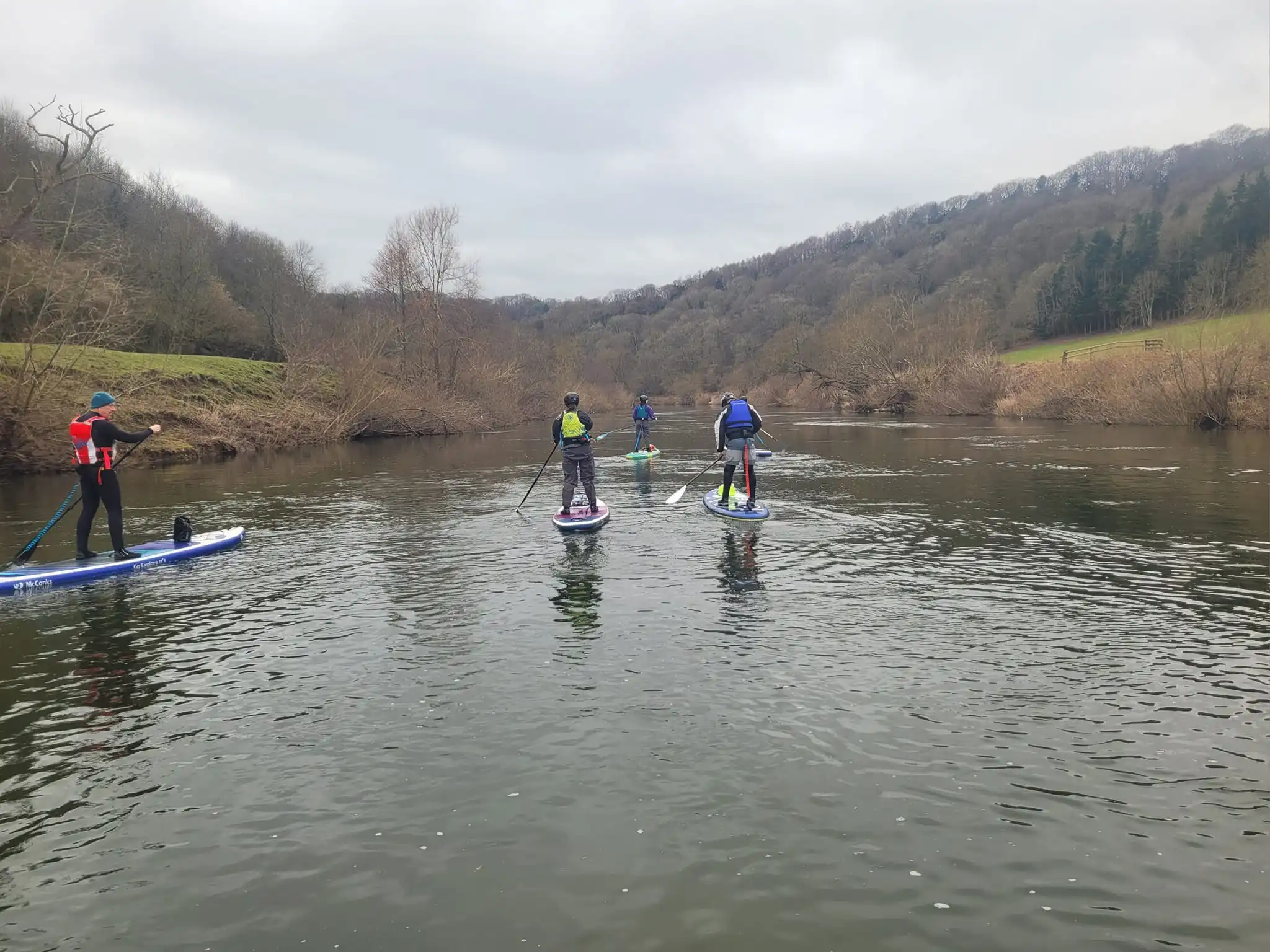 Group of paddleboarders on the river wye