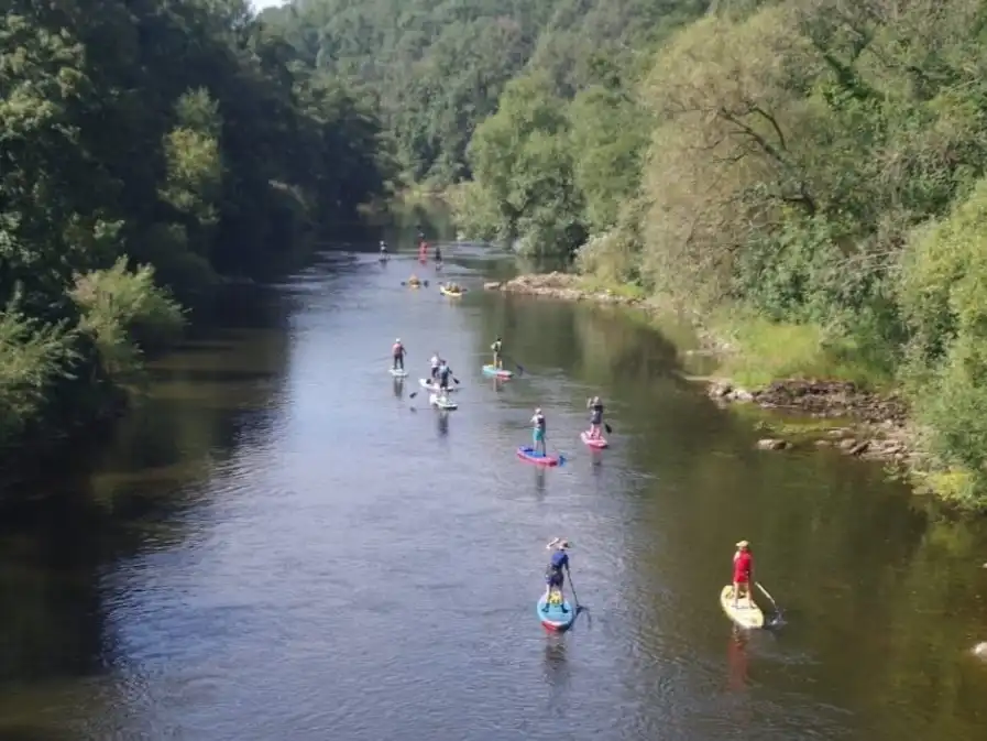 Group of paddleboarders on the river wye
