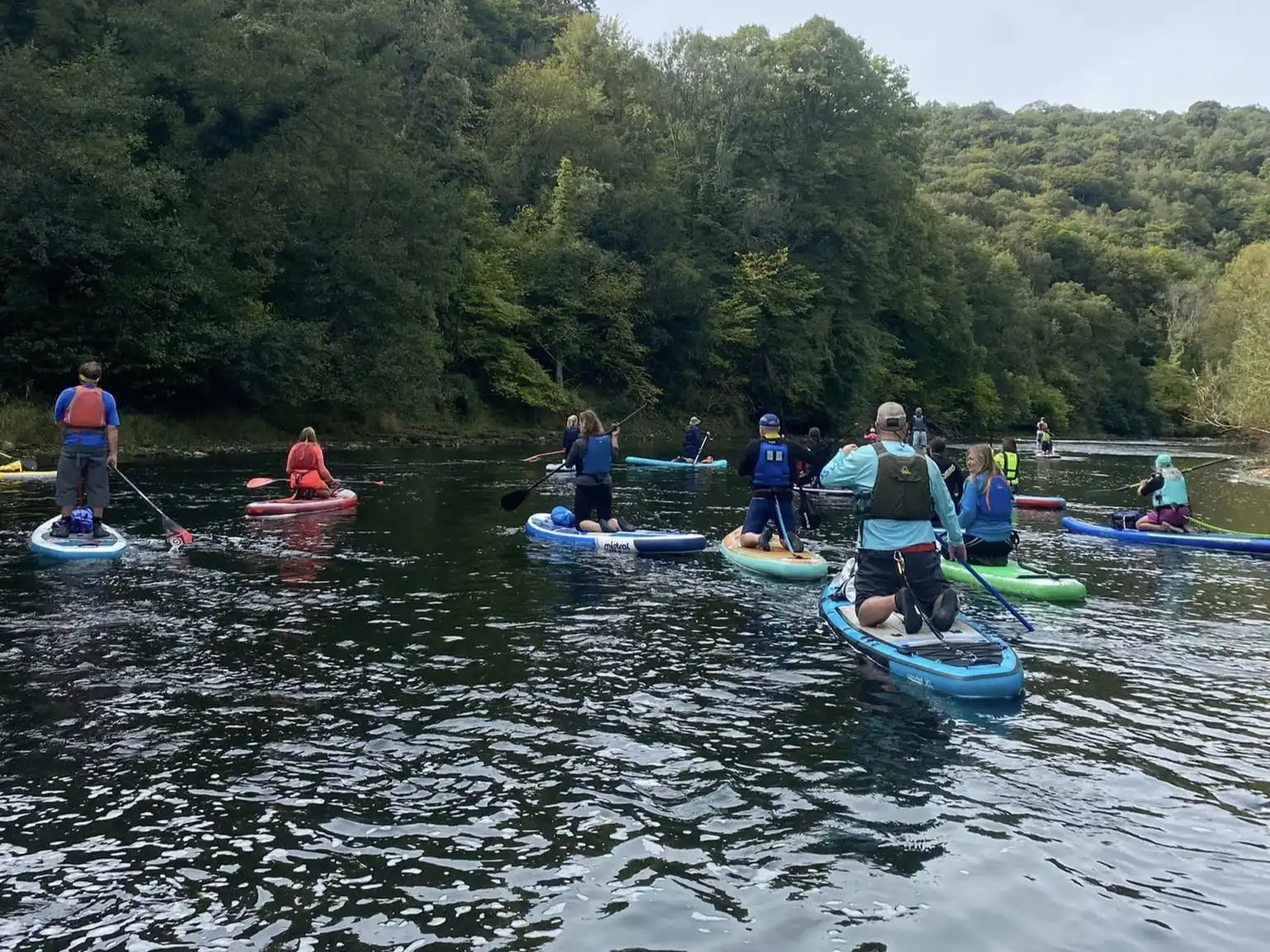 Group of paddleboarders on the river wye