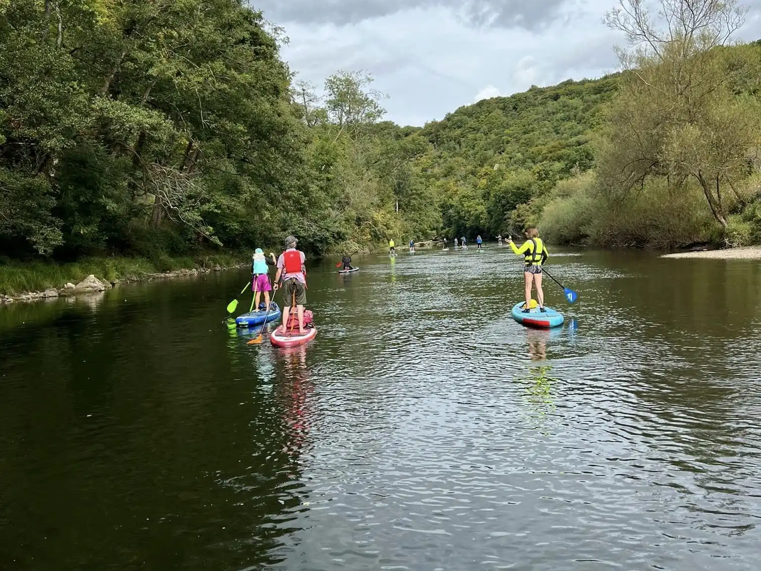 Group of paddleboarders on the river wye